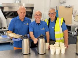 Members ready to serve refreshments